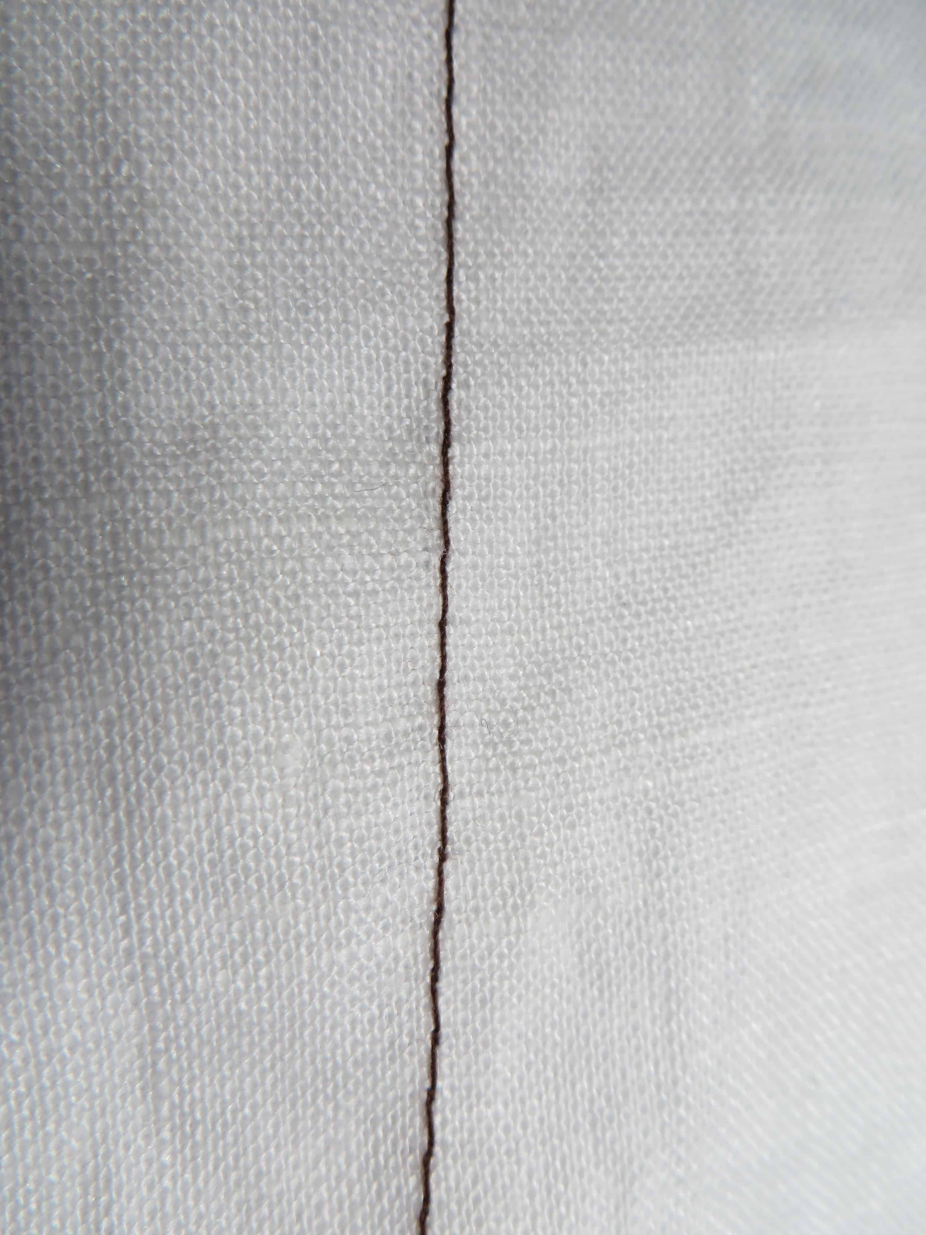 Single needle lock stitch back side